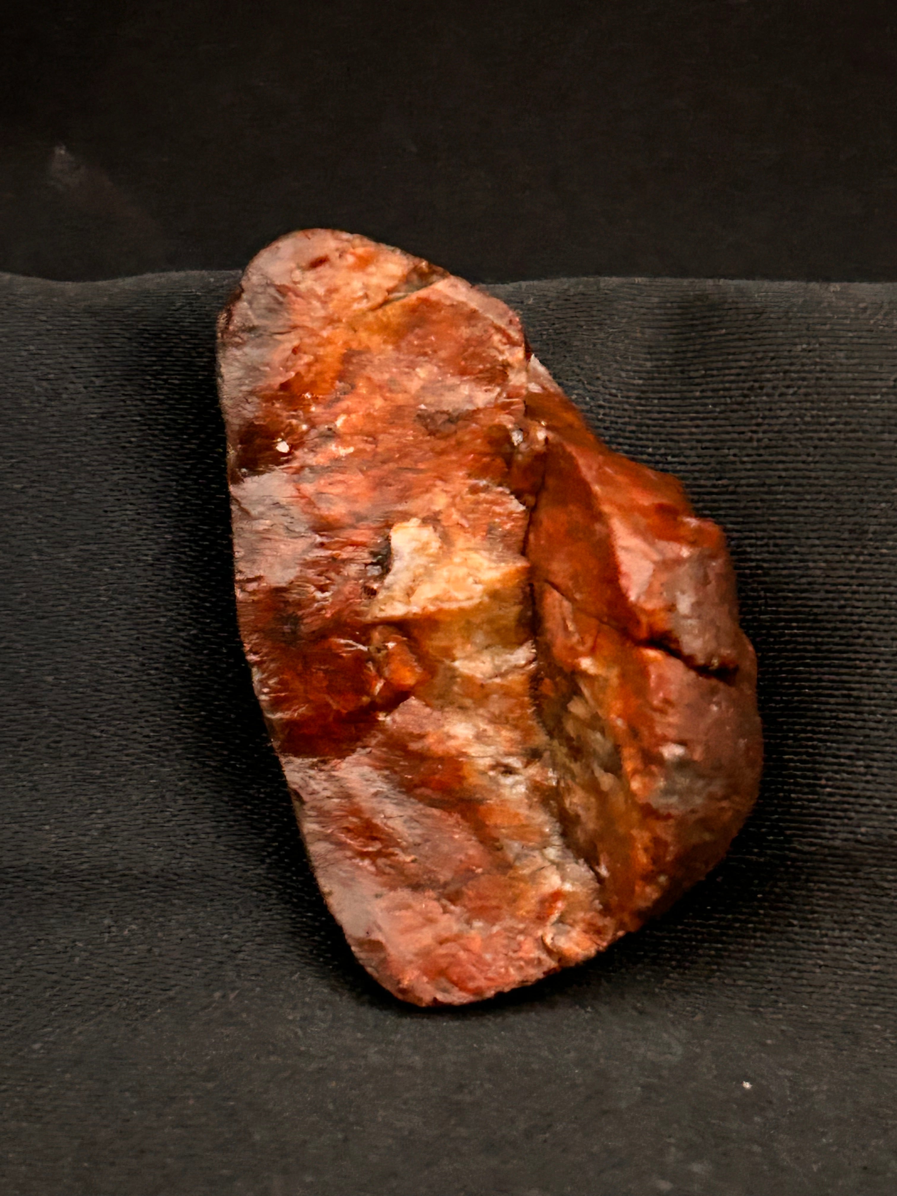 A COAL FROM THE ANCIENT FIRE

Material: Petrified Jasper with Hematite Influence

Weight: 1.12 ounces