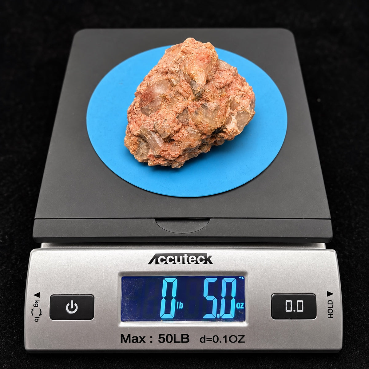 DP-PEG-01 on digital scale showing 5.0 ounces