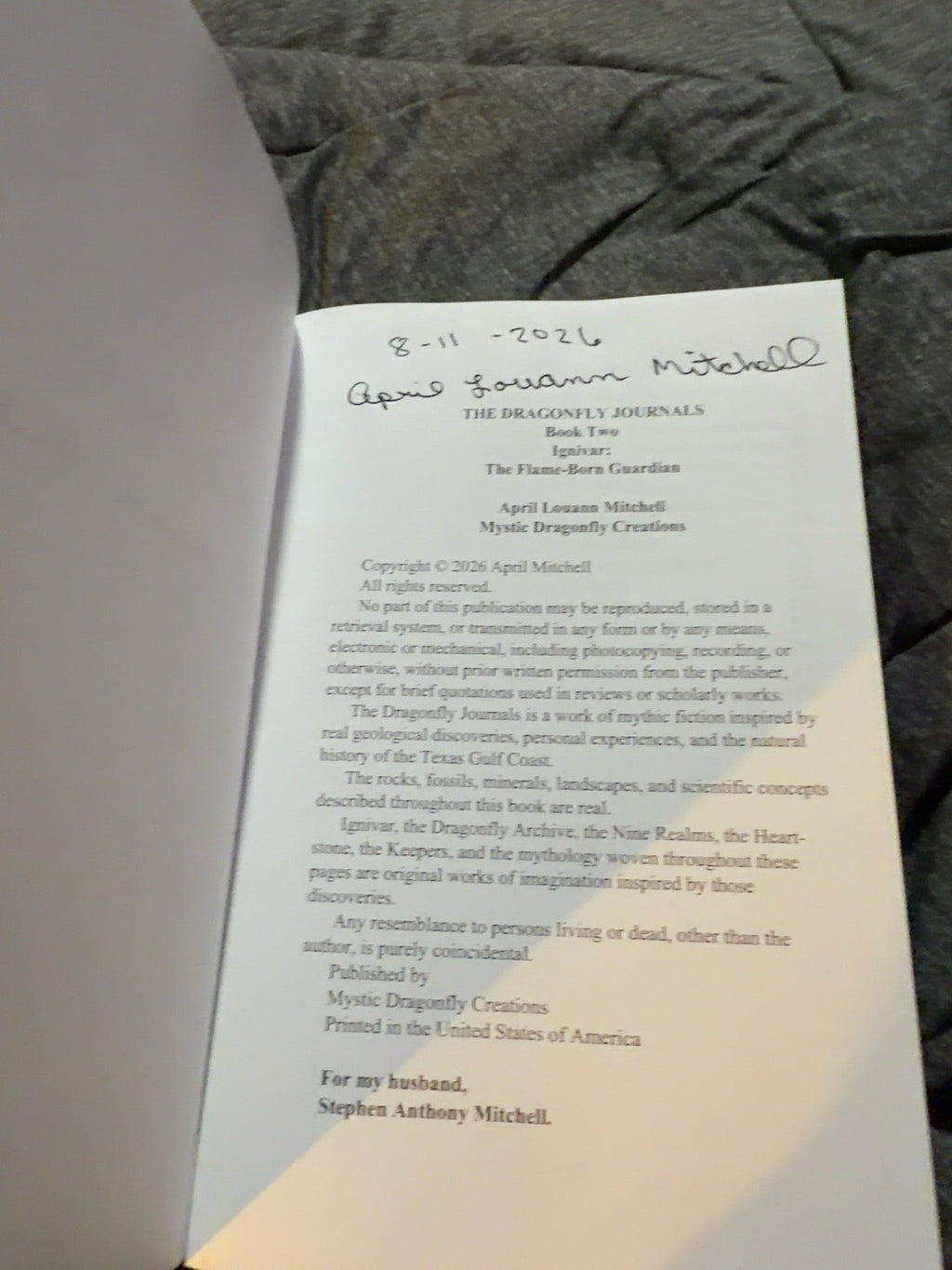 Signed interior page of Ignivar: The Flame-Born Guardian by April Louann Mitchell