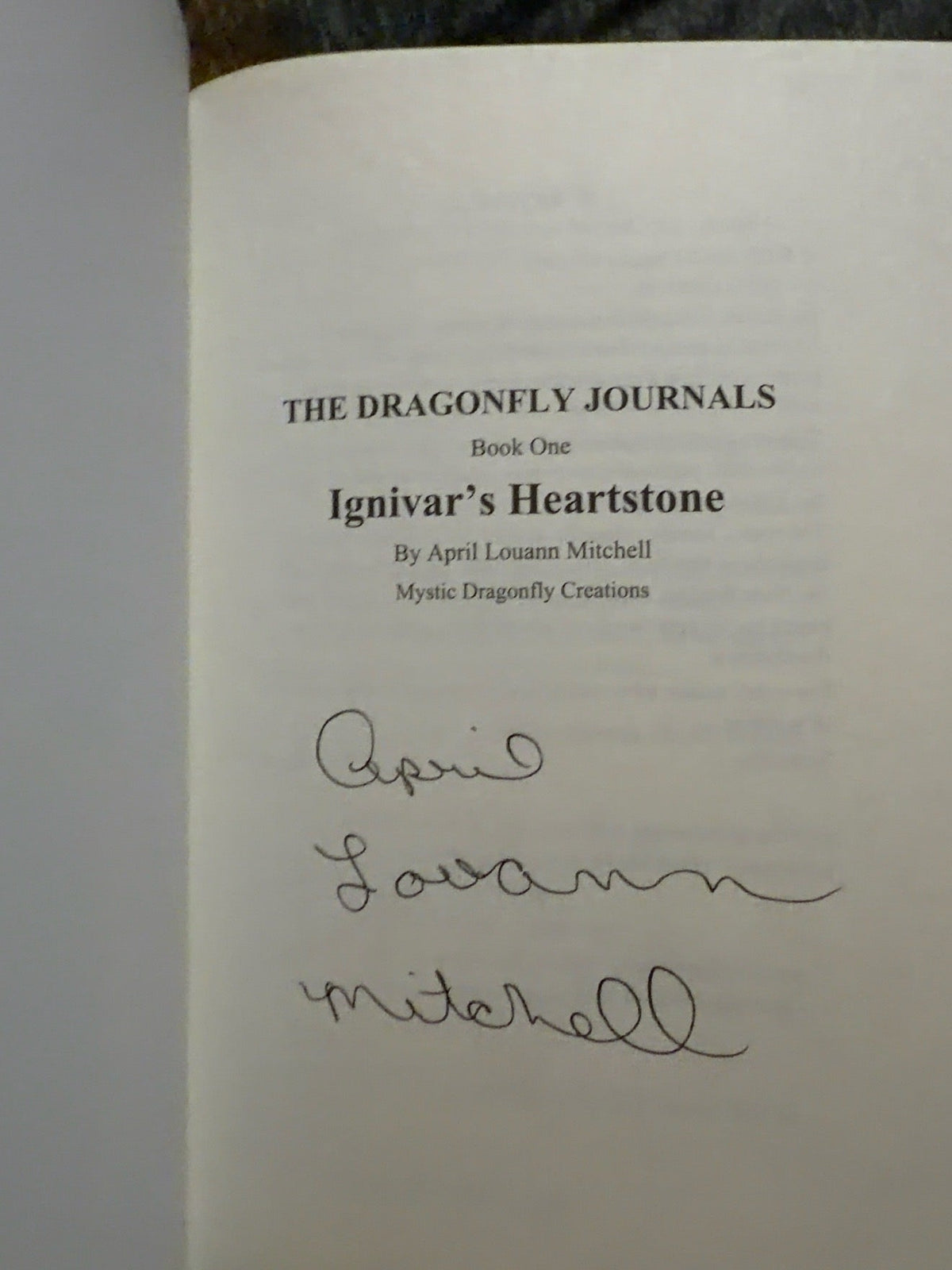 Signed title page of Ignivar's Heartstone by April Louann Mitchell